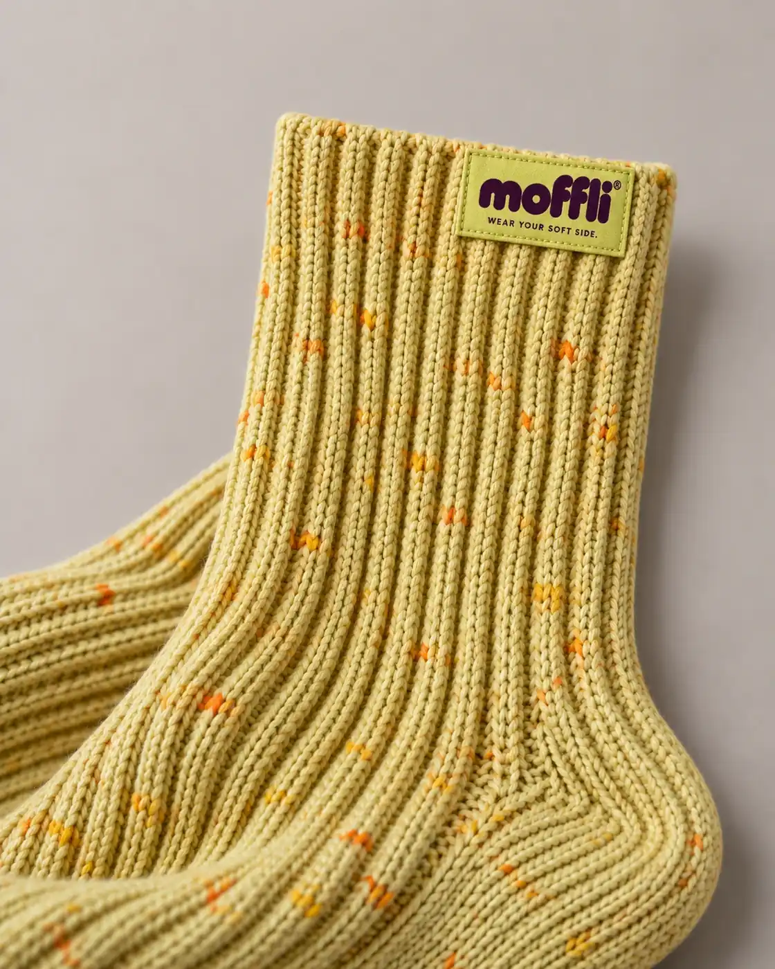 Knit detail and patch of MOFFLI Cosy Socks Butter Yellow