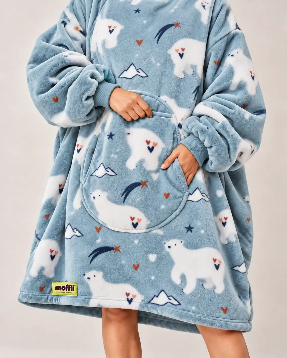 Front detail of the Polar Bear Moffli with pocket, cuffs and print of bears, hearts, stars and mountains