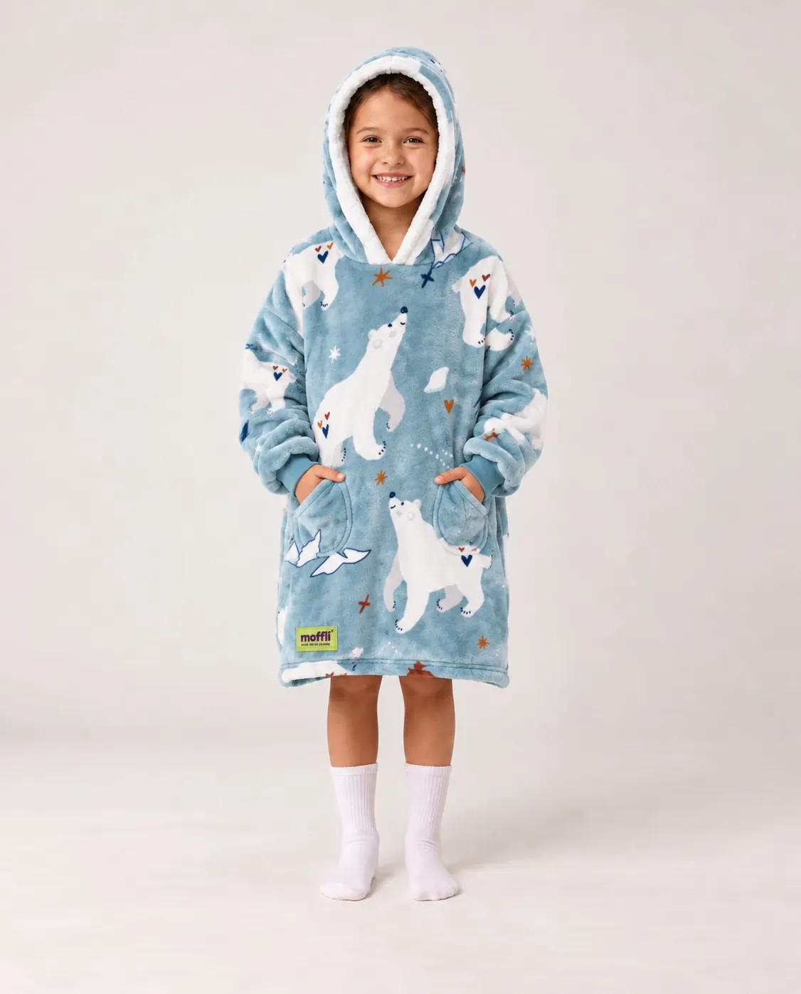 Girl standing wearing the Polar Bear Kids Moffli, sherpa-lined hood up