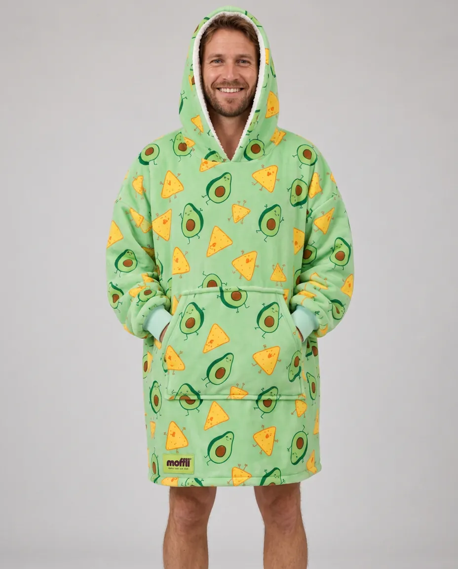 Smiling man full length wearing the Avocado & Nachos Moffli and hands in pocket